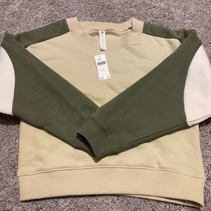 Cream and green sweatshirt from Anthropologie